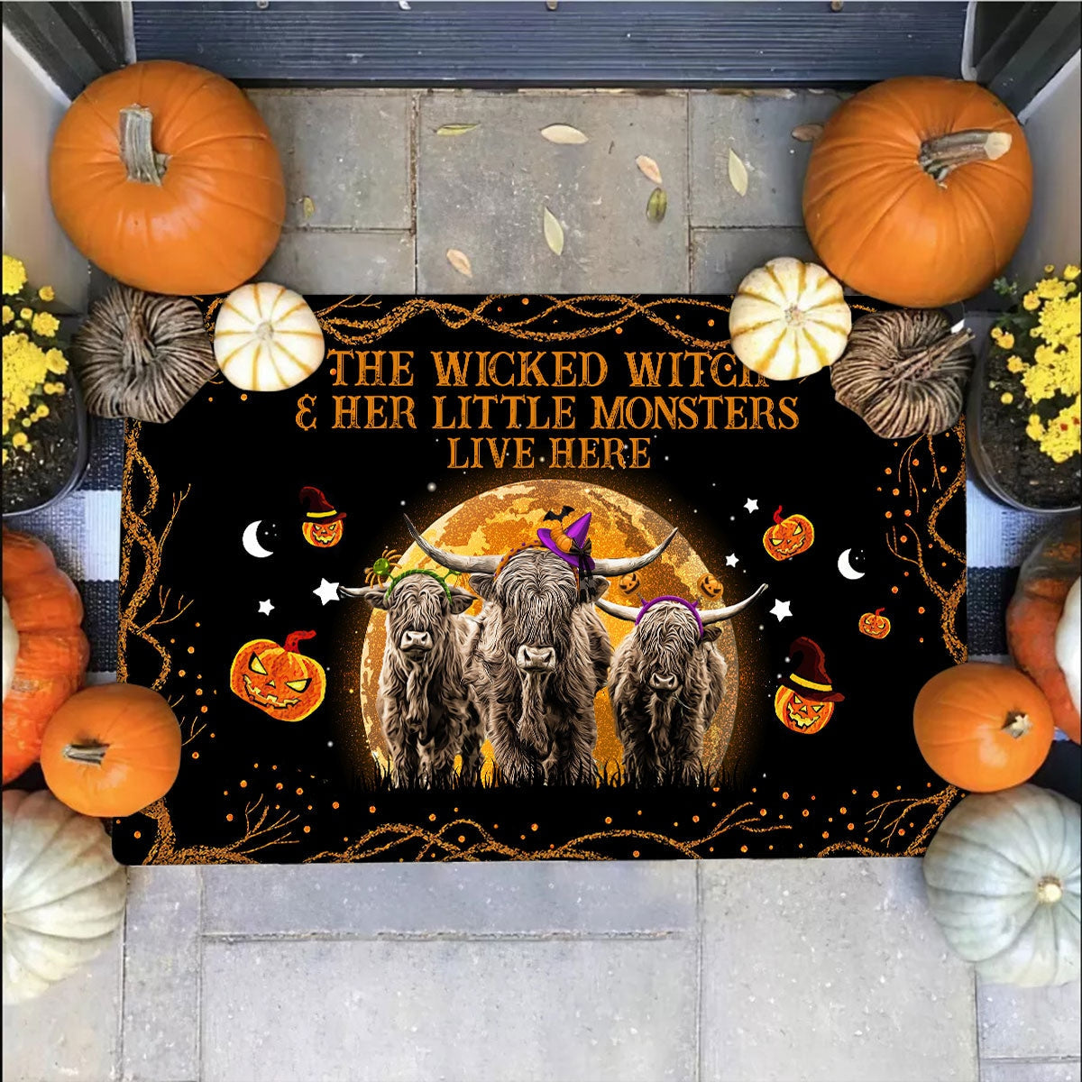 Highland - The Wicked Witch And Her Little Monsters Live Here Doormat